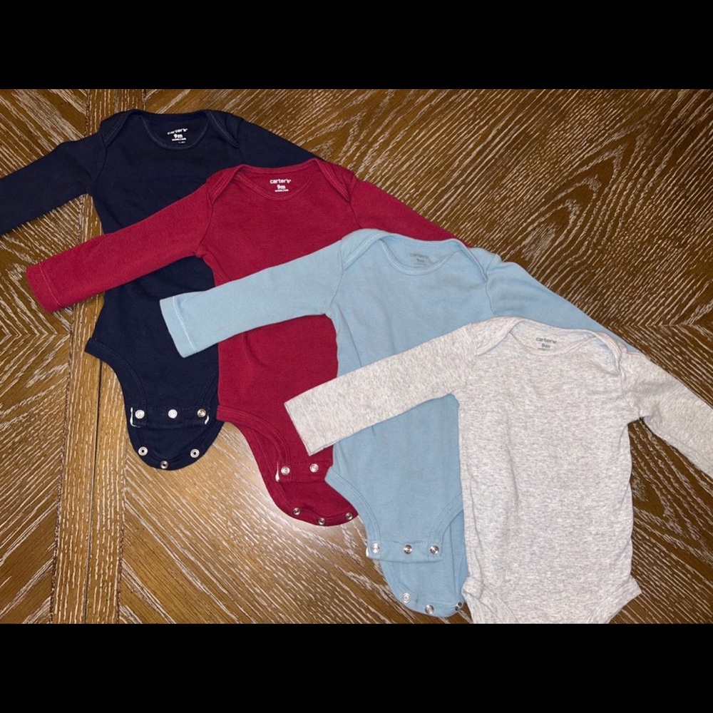Carters Set of Four Baby Bodysuits in Assorted Colors